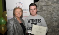 Martin McDonagh receives his Award from Minister Fitzgerald